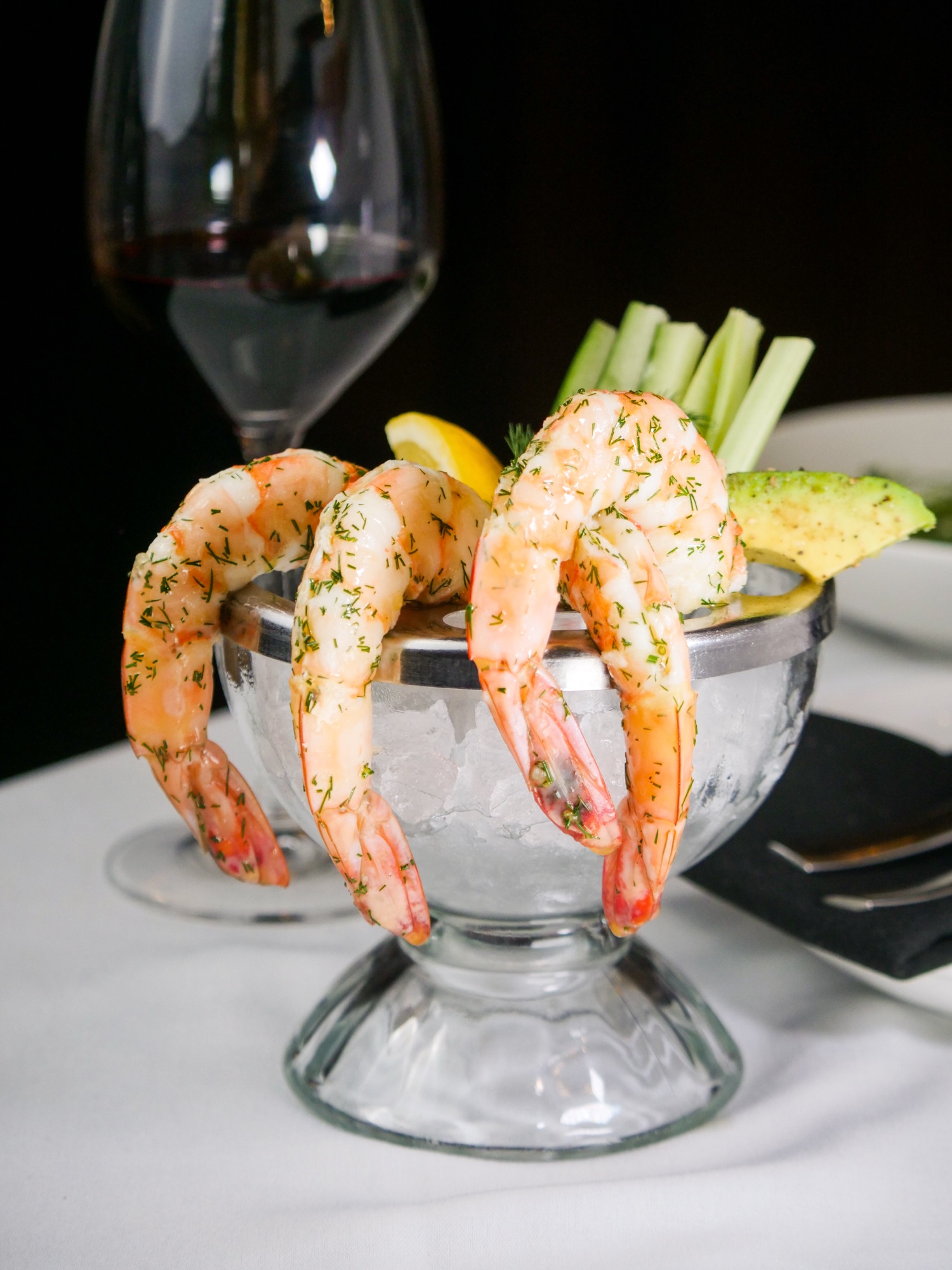 Chilled jumbo shrimp cocktail with horseradish cocktail sauce at The Arthur J